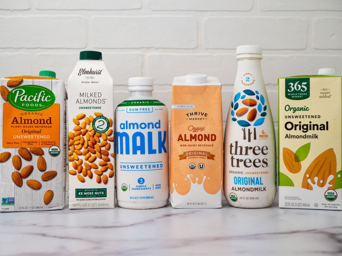 Best almonds milk brands lined up on counter.