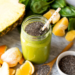 Chia seed smoothie with oranges, pineapple and spinach.