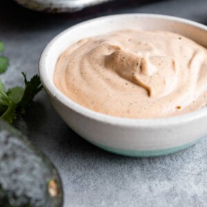 White bowl of chipotle ranch dressing.
