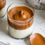 Layered Dalgona coffee in a glass.