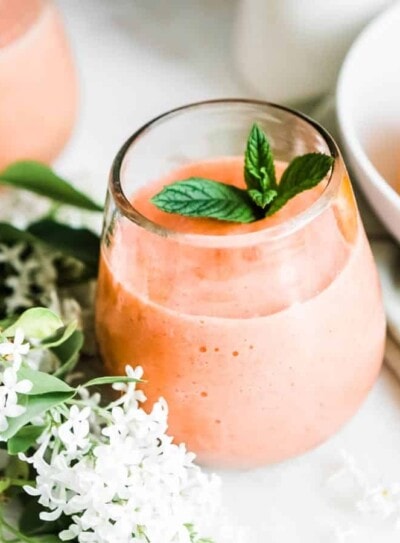 Grapefruit smoothie in a small glass.