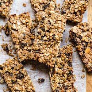 Homemade granola bars on parchment paper.
