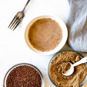 Small bowls of flaxseed, ground flaxseed, and flax egg.