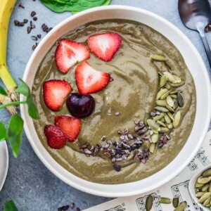 Smoothie bowl topped with strawberries.