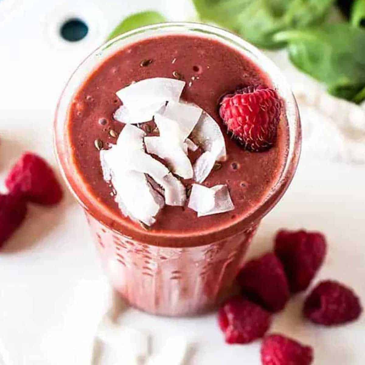 Raspberry smoothie with shredded coconut on top